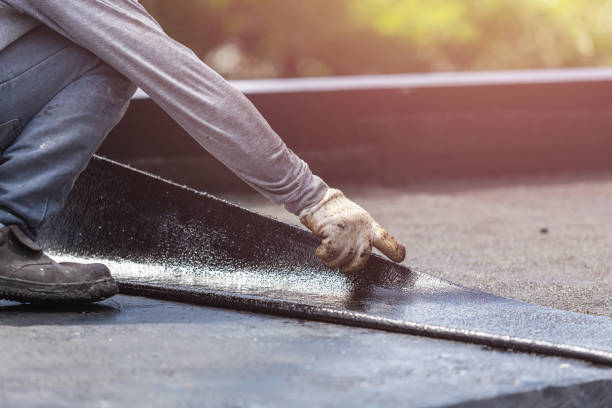 Professional Basement Waterproofing technician working in Vallonia, IN
